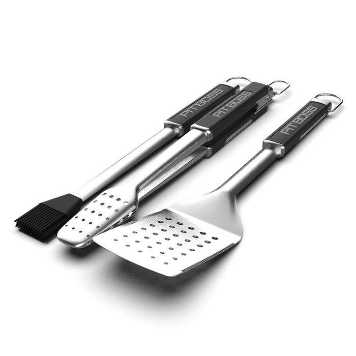 Pit Boss 3-Piece BBQ set. Stainless steel with black handles and pit boss logo for grilling and smoking. Includes spatula, tons, and sauce mop