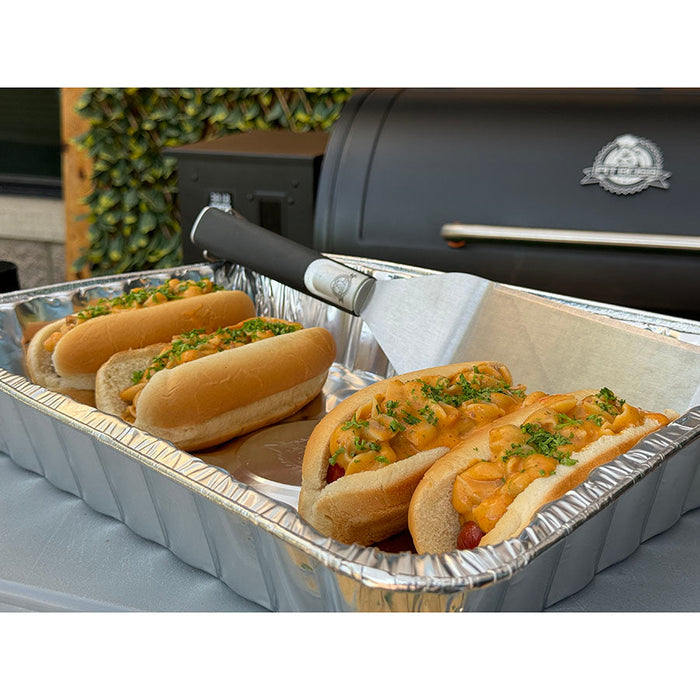 Silver 4-pack all-purpose foil pans from Pit Boss Grills, perfect for cooking and serving.