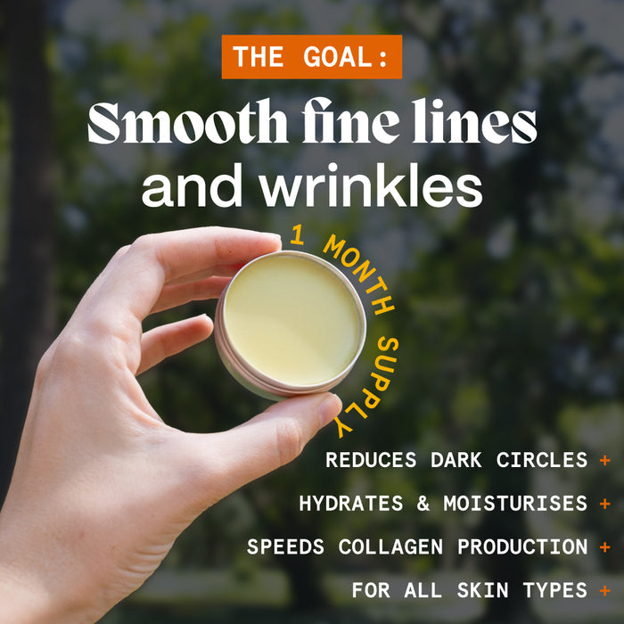 Hand holding the open night balm outdoors with a graphic listing fine-line and dark-circle benefits