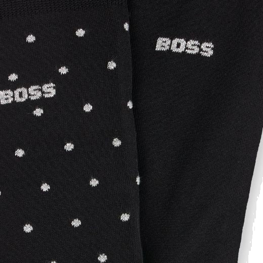This BOSS 2 Pack Men's Cotton Blend Socks Gift Set has a dark blue polka dot pair and a plain black with the BOSS brand name in metallic silver.