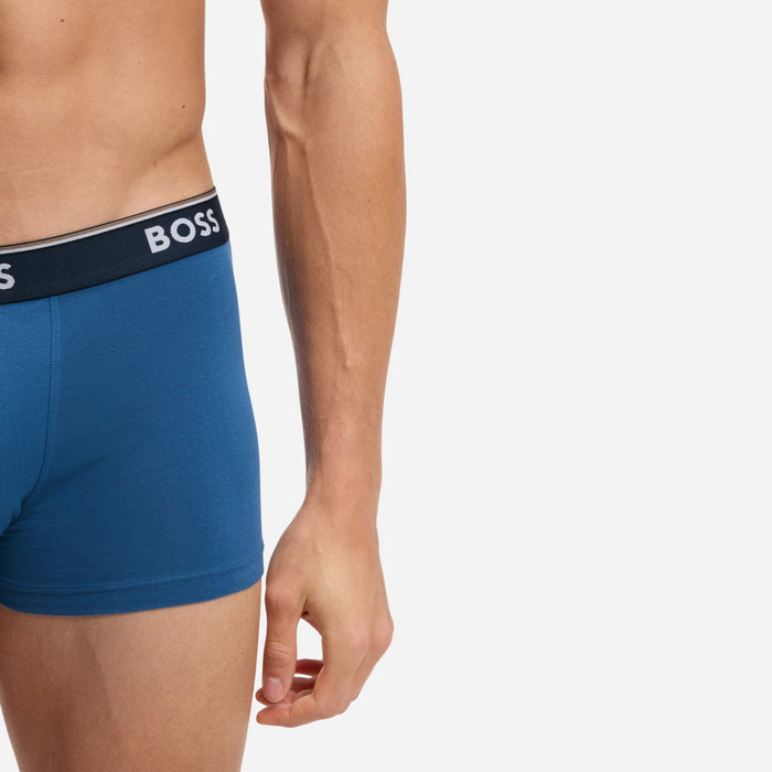 Close up of the front of the blue pair from the BOSS 3-Pack of Blue Power Cotton Stretch Trunks with Logo Waistband.