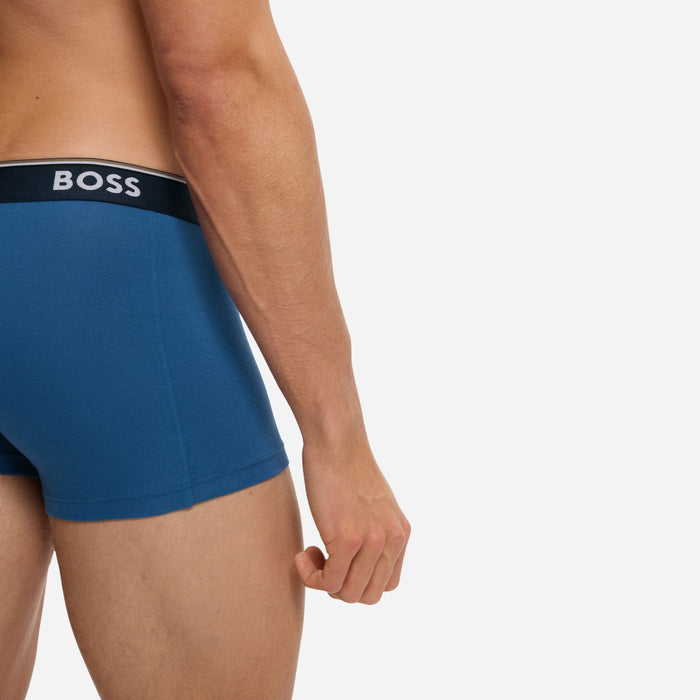 Side view of the blue pair from the BOSS 3-Pack of Blue Power Cotton Stretch Trunks with Logo Waistband.