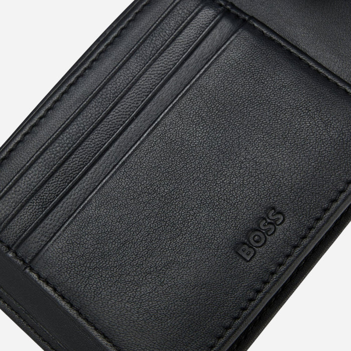 The BOSS logo embossed inside the BOSS Arezzo Grained Black Leather Trifold Wallet with Embossed Logo.