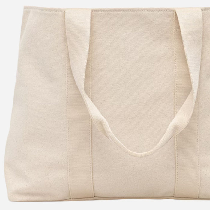 Back view of the BOSS Becky Beige Tote with Hugo Heart Logo.