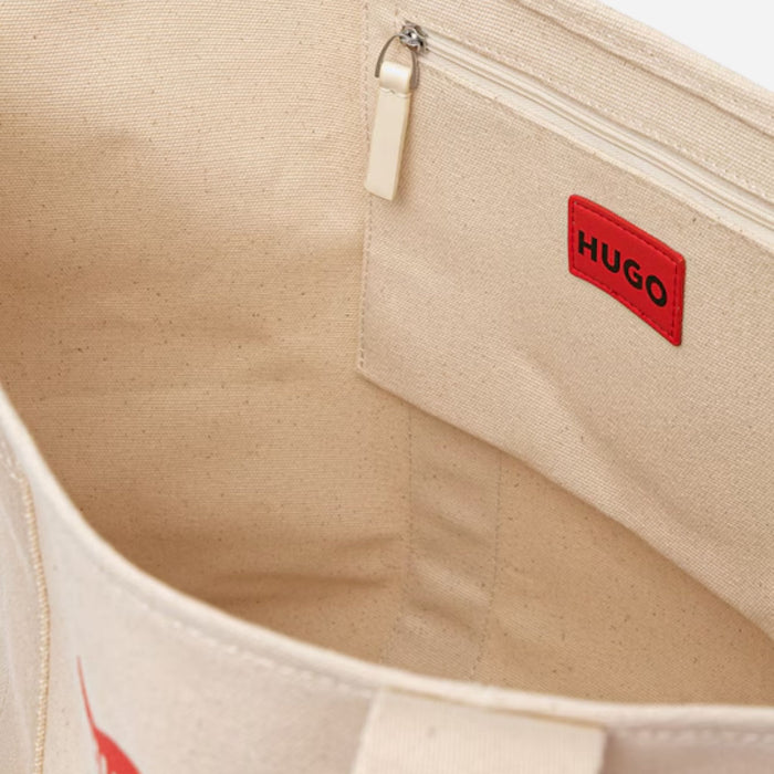 Inside the BOSS Becky Beige Tote with Hugo Heart Logo.