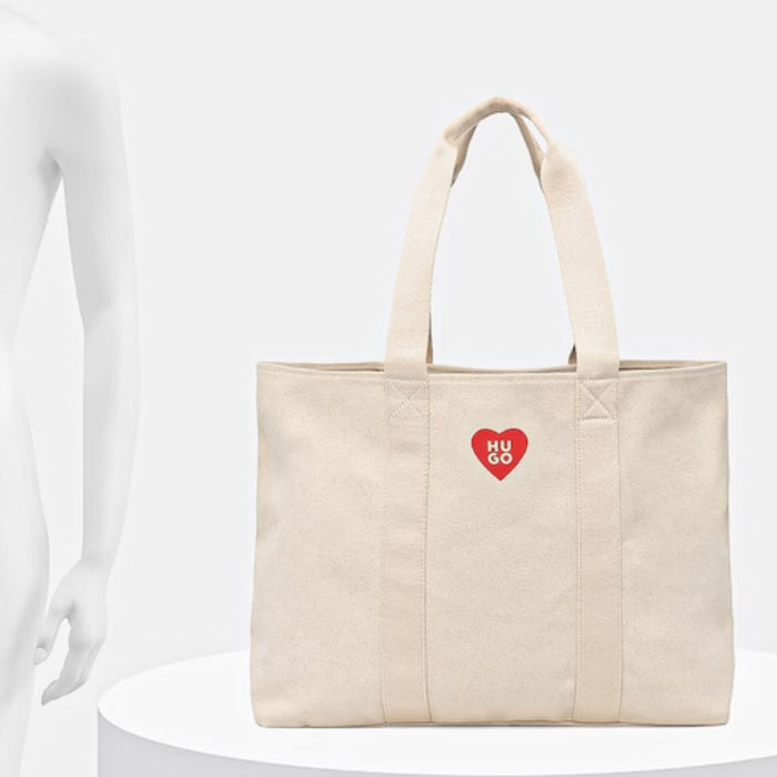 The BOSS Becky Beige Tote with Hugo Heart Logo by BOSS.