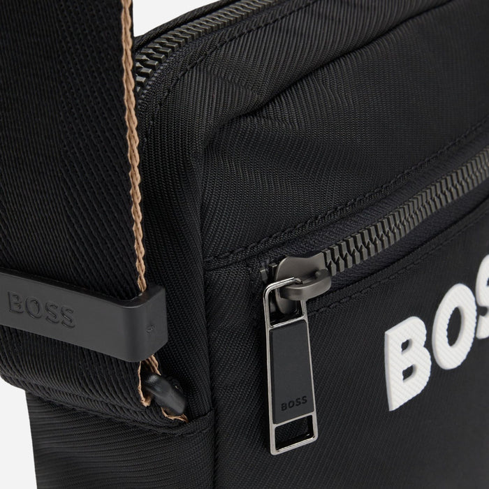 Close up of the BOSS Catch 3.0 Black NS Zip Top Cross Body Bag with Raised White Logo.