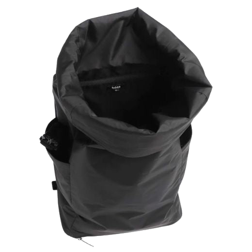 The spacious interior of the Catch EVO Black Rolltop Backpack includes two main compartments and two slip pockets.
