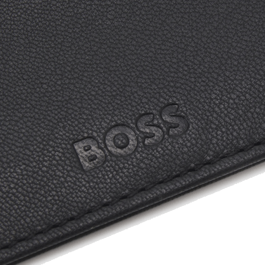 this Crew Black Leather 4CC Card Holder by BOSS has the brand name blind embossed on the front.