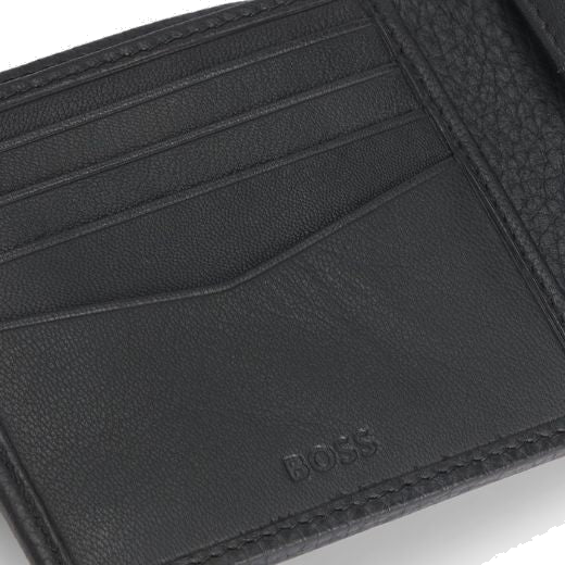 This BOSS Crosstown 8CC Black Grained Leather Bifold Wallet is made out of grained leather with a smooth surface on the card slots.