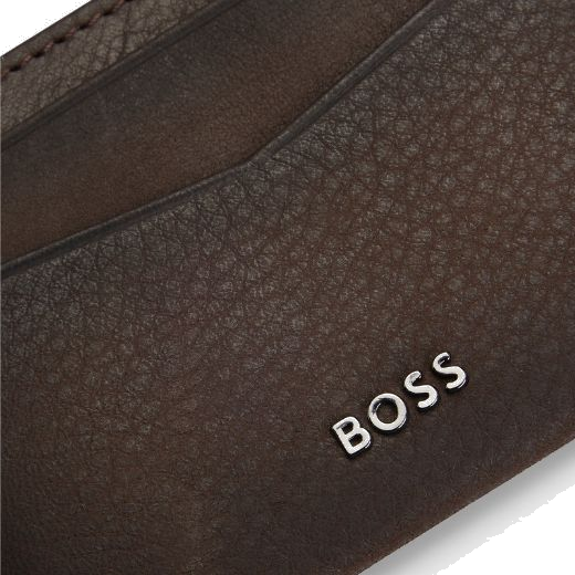This Crosstown Brown Suede 4CC Card Holder by BOSS is made out of suede cowhide that has a slight ombre finish.