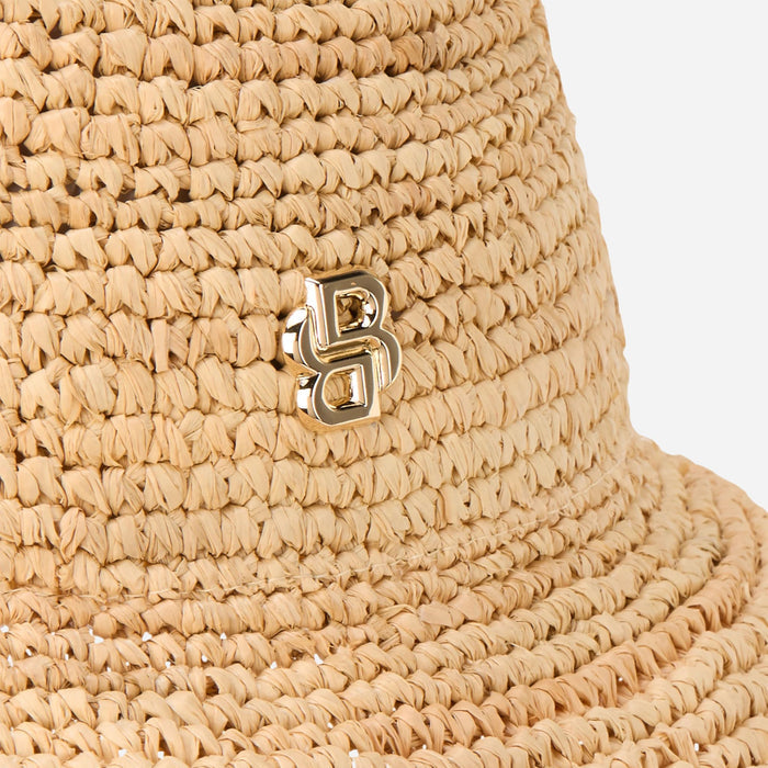 Close up of the BOSS Danika CR Beige and Brown Woven Hat with Metal Logo.