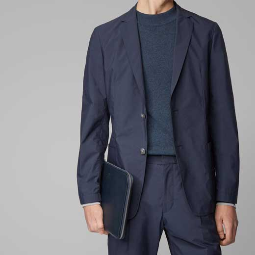 This is the BOSS Flat Navy Folio with Embossed Logo.