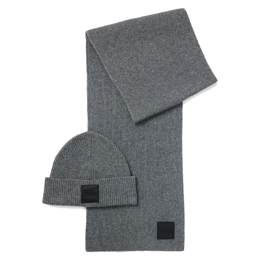 This Grey Metaverse Knit Beanie Hat and Scarf Set by BOSS has the brand name embroidered on a small patch in black.