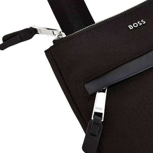 This BOSS Highway Black Nylon Envelope Bag has polished silver trims with zip pulls that have the BOSS brand name engraved.