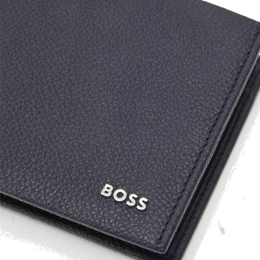 This BOSS Highway Navy Grained Leather 8CC Wallet has the brand name on the front in polished silver lettering.