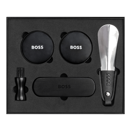 This Hugo Boss Iconic Black Shoe Care Kit comes with shoe polish, a shoe horn, two brushes and a cloth.