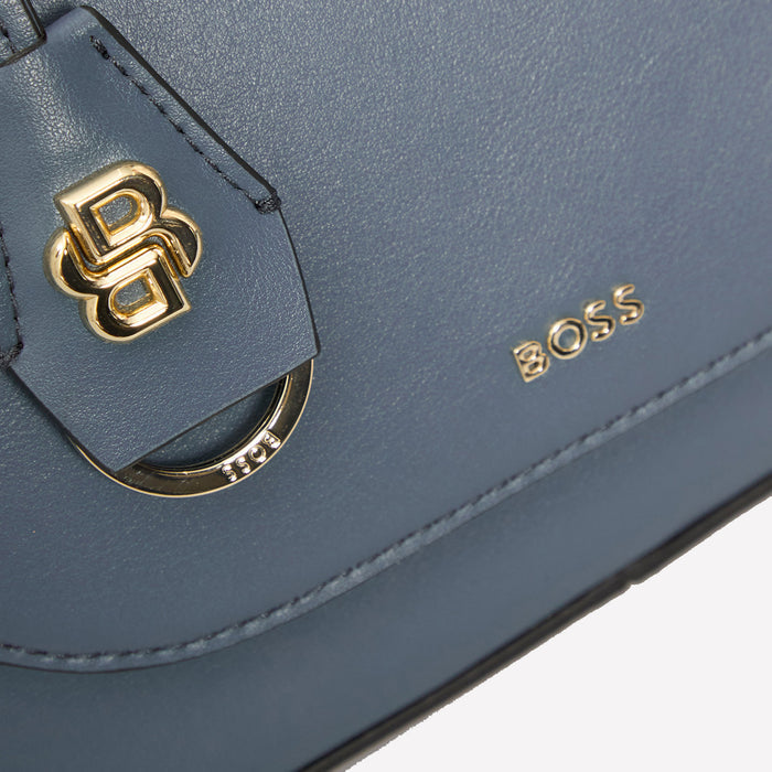 BOSS Numah light blue ross body bag comes with the brand name on the front and a logo key fob.
