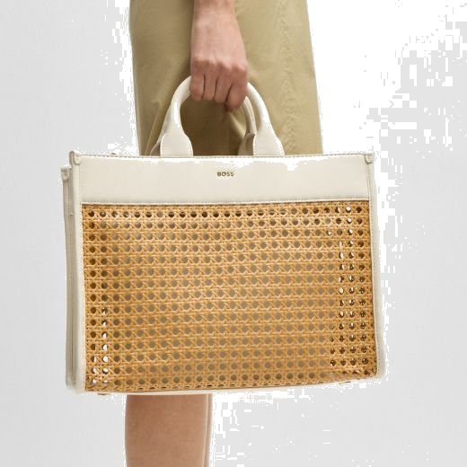 BOSS' White Faux Leather Woven Tote Bag With Zip Pouch is great for summer days out whether it's on holiday or just pottering about outdoors.