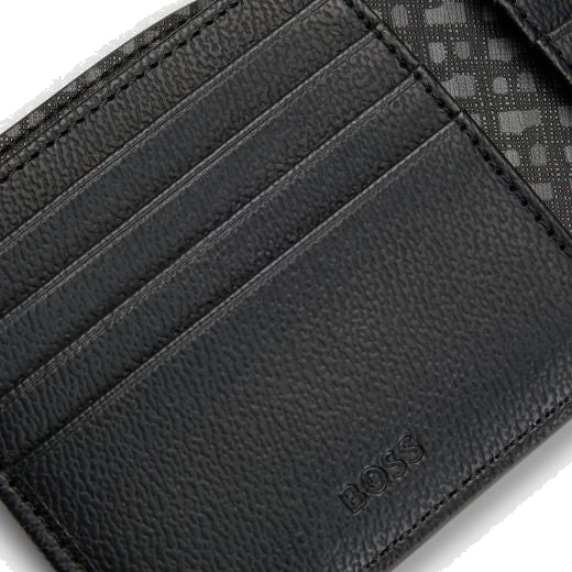 The Zair Monogram Faux Leather 8CC Wallet by BOSS has the brand name in blind embossing on the inside.