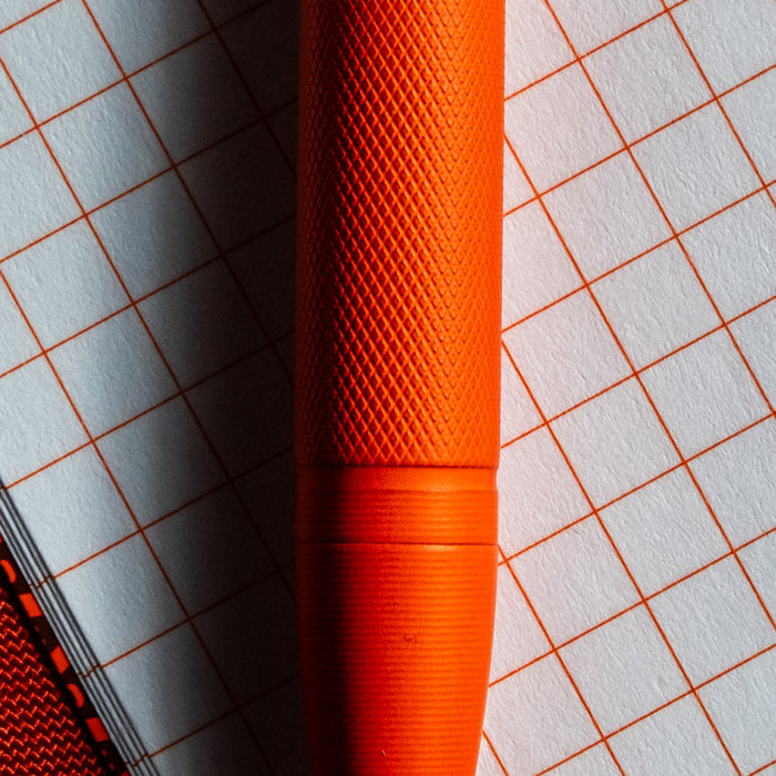 Carryology Blaze Orange Essentials Slim Bolt Action Pen