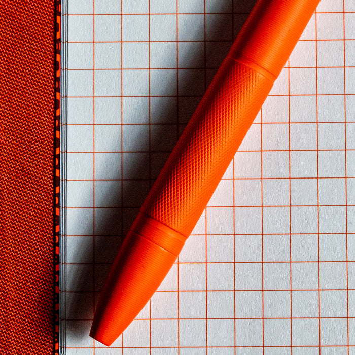 Carryology Blaze Orange Essentials Slim Bolt Action Pen