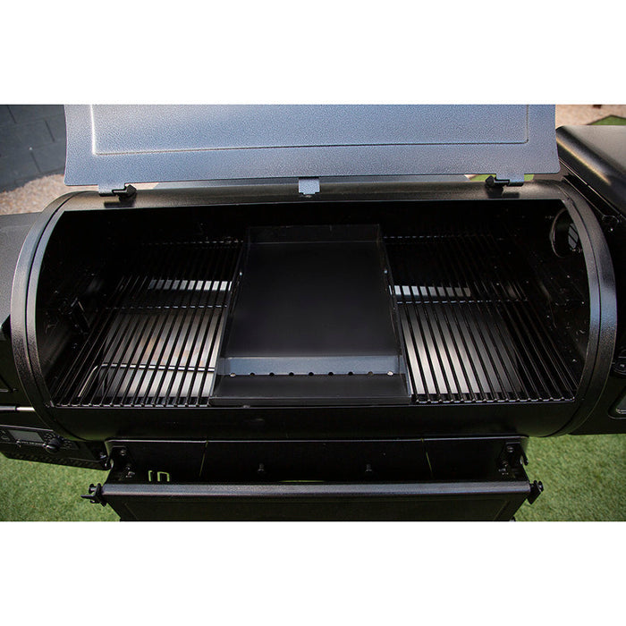 Pit Boss Ceramic Coated Griddle Insert and Cooking Grates Set inside grill. Grill hood open.