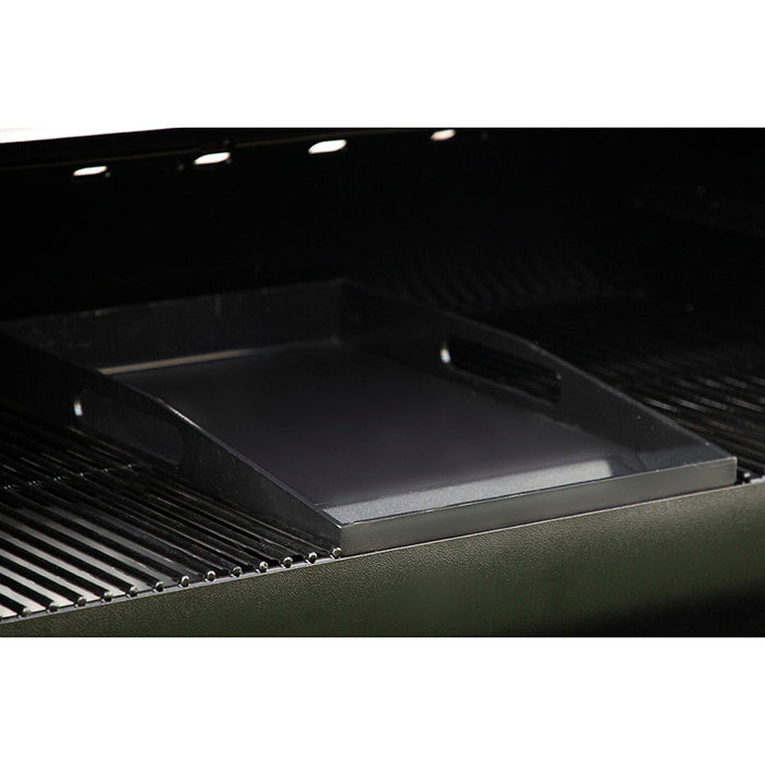 Close up of Pit Boss Ceramic Coated Griddle Insert and Cooking Grates. Side view.