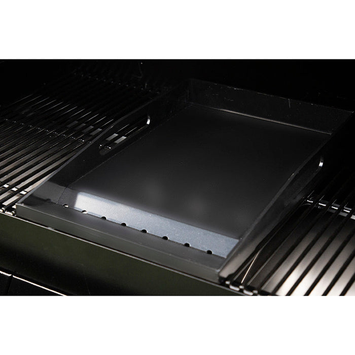 Close up of Pit Boss Ceramic Coated Griddle Insert and Cooking Grates. Side view.