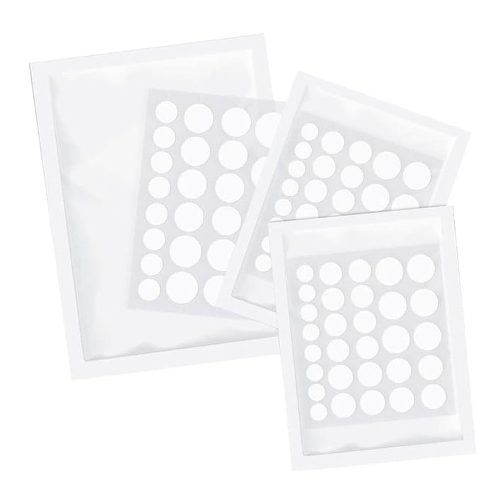 Three sheets of clear hydrocolloid Norse Organics acne patches in assorted sizes