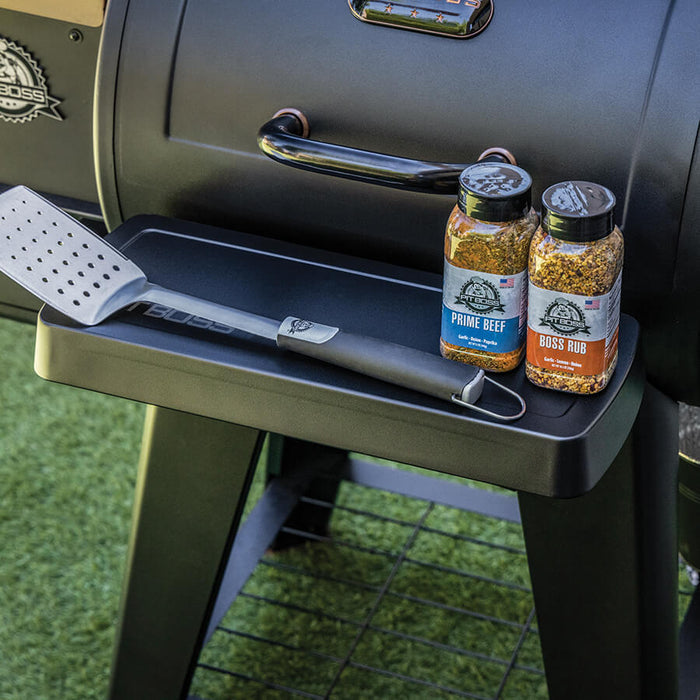 Pit Boss Grills Front Shelf - 500 Series Onyx/FB2, black upgrade shelf holding seasoning and tools.