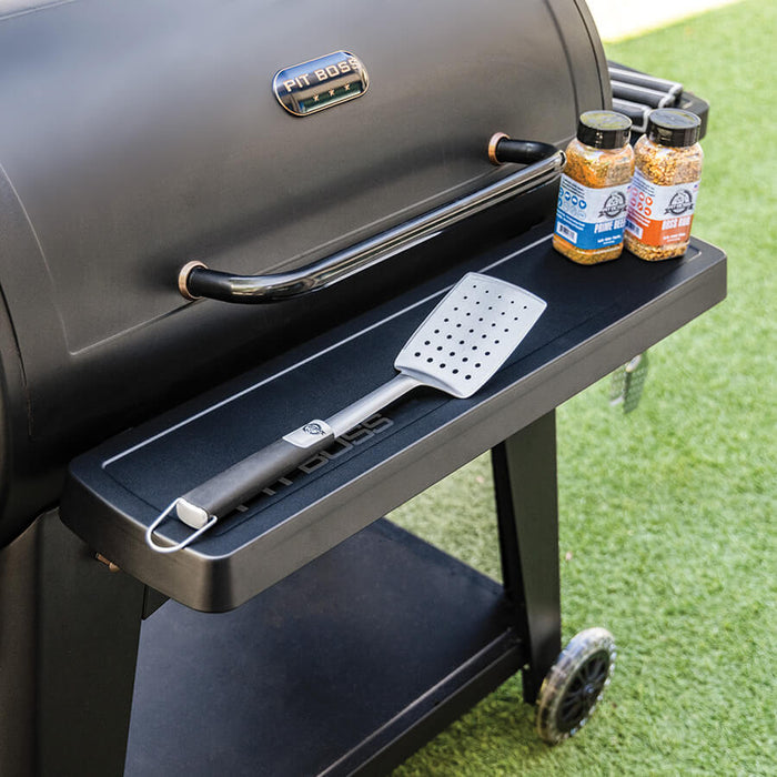 Black Pit Boss Grills Austin XL/Savannah Onyx Edition front shelf with accessories.