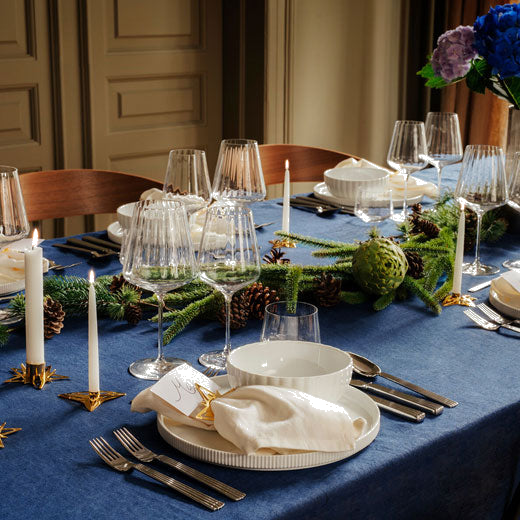 Georg Jensen's 18 KT. Gold Plated Christmas Star Napkin Ring/Table Card Holders come in packs of two.