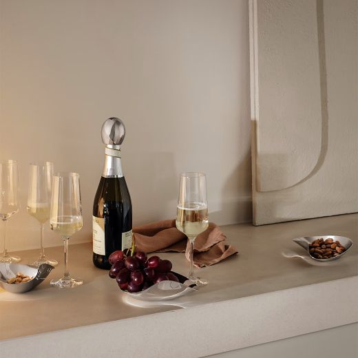 These Bernadotte Champagne Flute Glasses, Set of 6 by Georg Jensen are great for any celebration and are sturdy with a sleek finish.