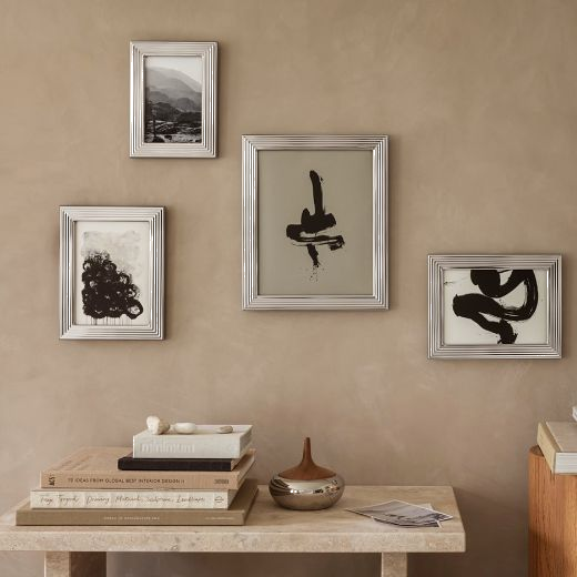 This Bernadotte Large Picture Frame 10x8" by Georg Jensen looks great on any wall or bedside table stood up.