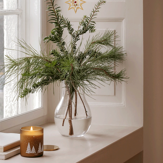 This Georg Jensen Christmas 2023 Winter Forest Scented Candle would look great on a mantelpiece during the festive season.