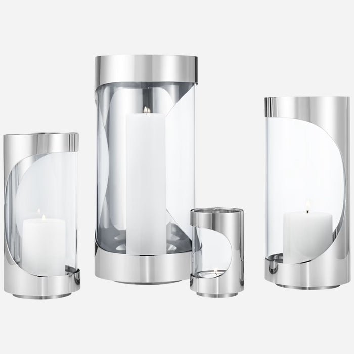 The Chrome Contours collection, including the Chrome Contours Large Stainless Steel and Glass Hurricane Candleholder.