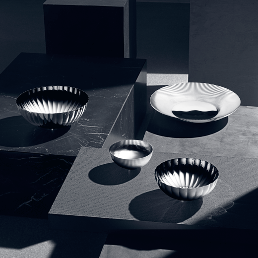 Georg Jensen's Stainless Steel Bernadotte Medium Bowl looks great on a table when serving multiple dishes