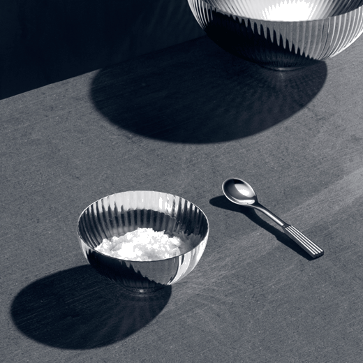 This Georg Jensen Stainless Steel Bernadotte Salt Cellar & Spoon is great for everyday use and matches with most tableware.
