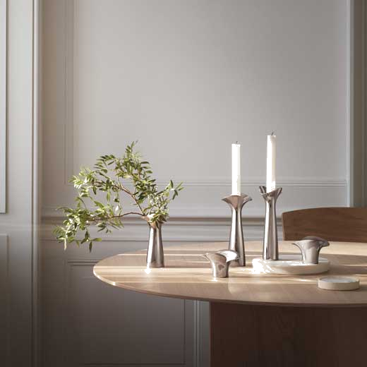 These Georg Jensen Stainless Steel Bloom Botanica Candle Holders come as a pair.