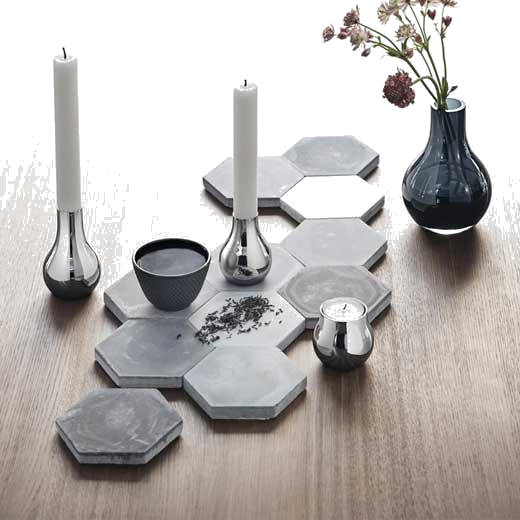 These Georg Jensen Cafu Polished Stainless Steel Pack of 2 Tealight Holders are perfect for the centre of your table.