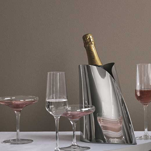 This georg jensen wine cooler can hold one champagne bottles.