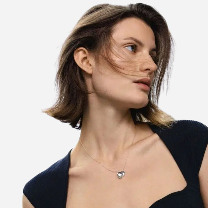 Model shot of Sterling Silver Heart Pendant 2023 Edition from Georg Jensen.