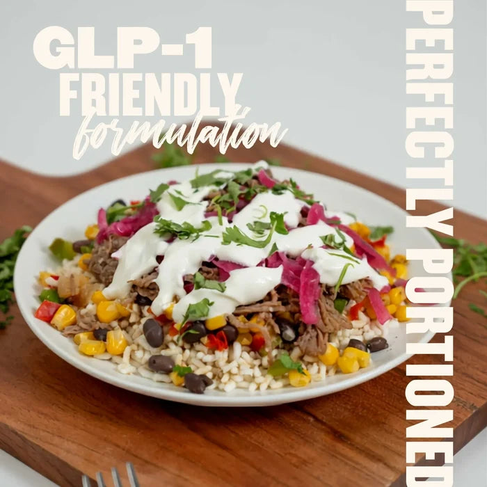 GLP-1-friendly meal with shredded beef, brown rice, black beans, corn, and pickled onions, portion-controlled