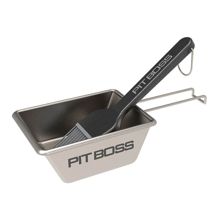 Griddle Sauce Pot and Brush. Silver sauce pot with black accents. Black brush with silver accents.