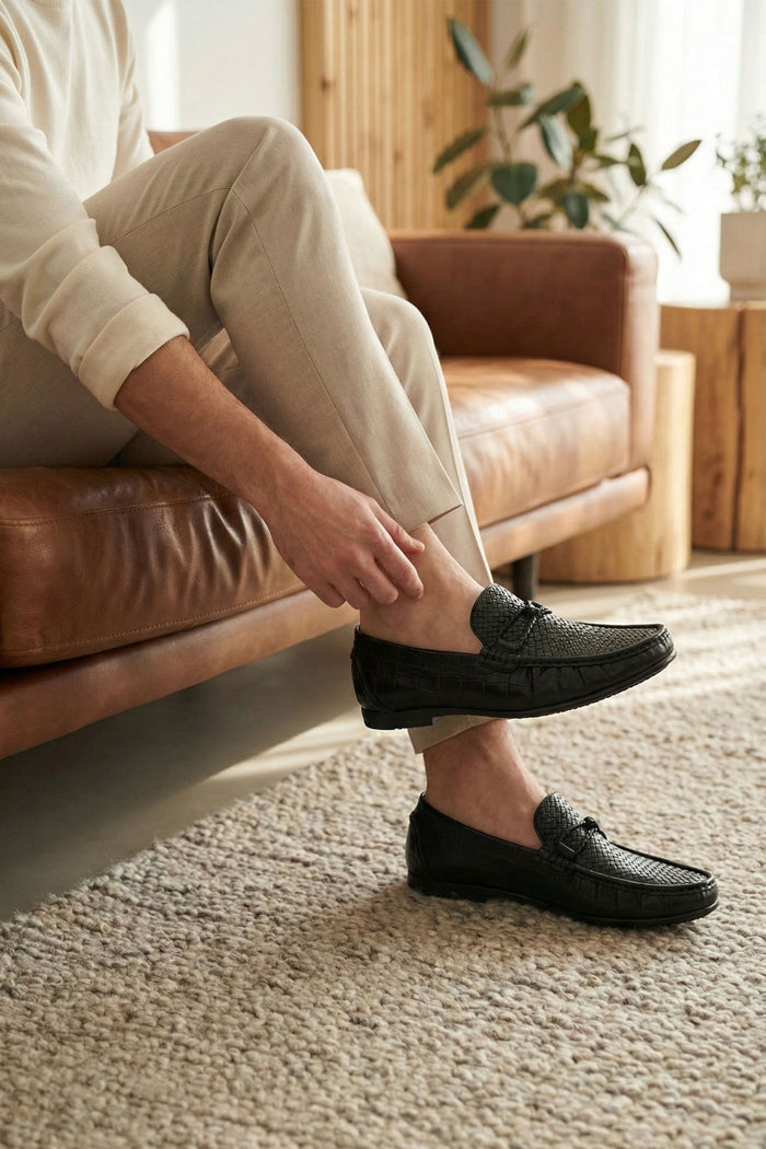 LOGO TITANIO MOCCASIN