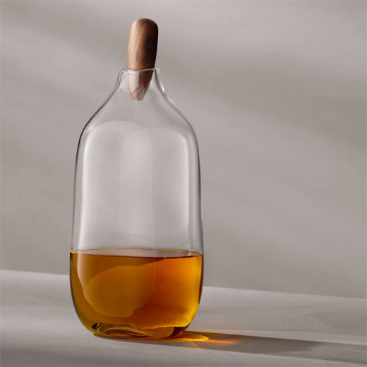 LSA's Signature Float Decanter with Walnut Stopper is 1.4 L.