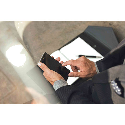 Model using a phone after writing in the Montblanc Augmented Paper set.