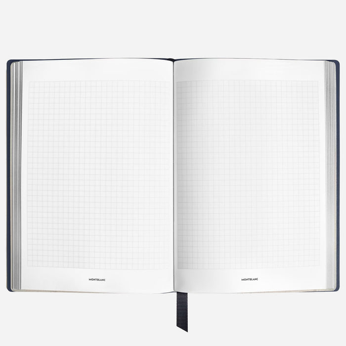 Inside the Fine Stationery Medium Ink Blue Sartorial Leather Notebook with Squared Pages.