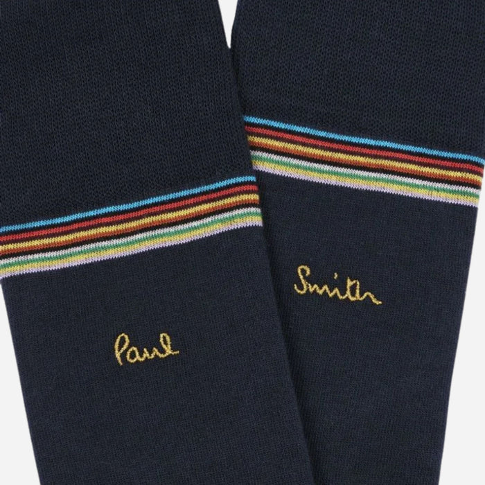 Close up of the dark blue pair from the Paul Smith 3-Pack Signature Stripe Mid-Calf Socks with Gold Logo.